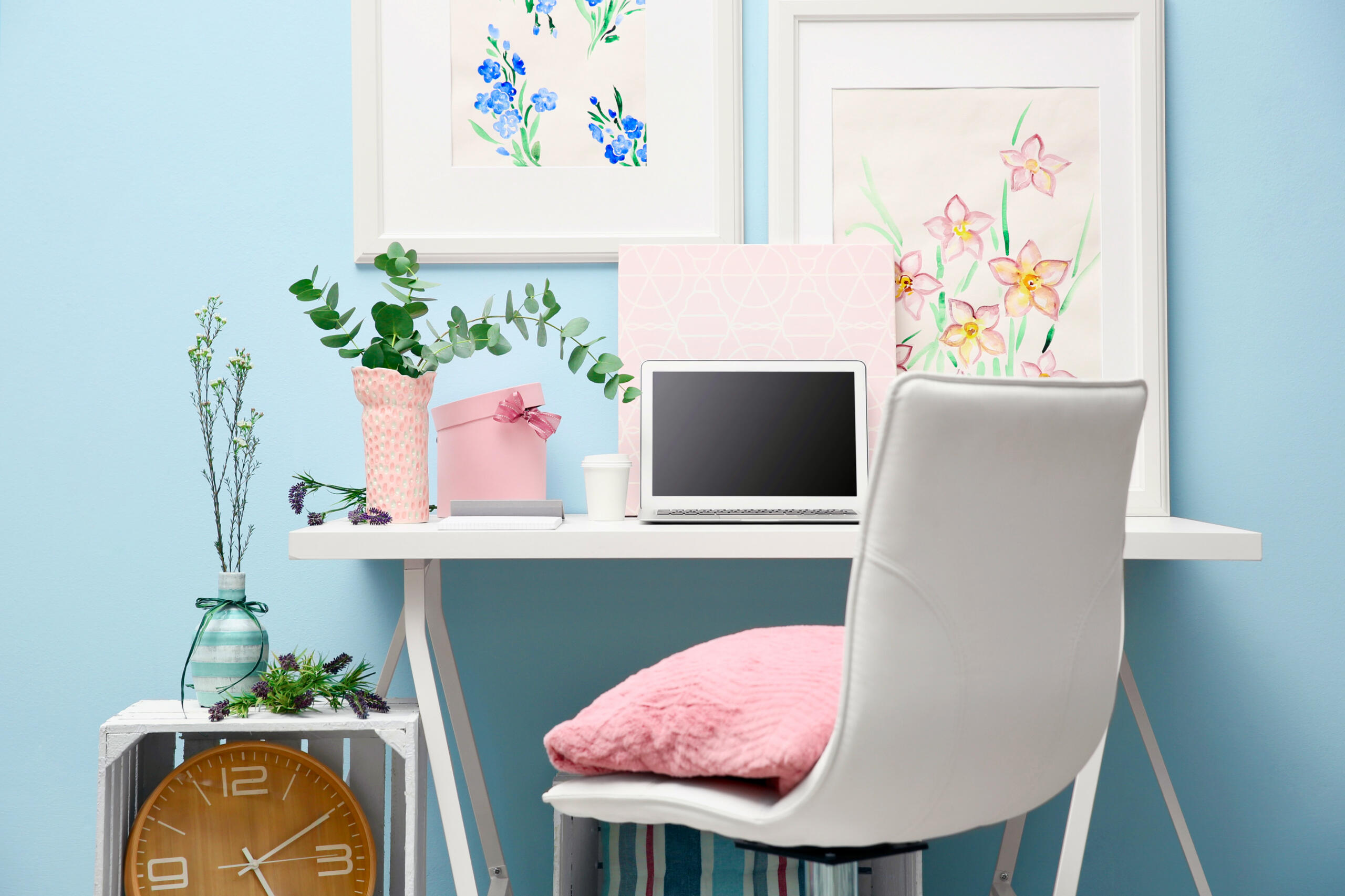 pretty-desk-setup-laptop-plants-coffee pastel blue and pink desk with chair, cushion, laptop, plants and creative vibe
